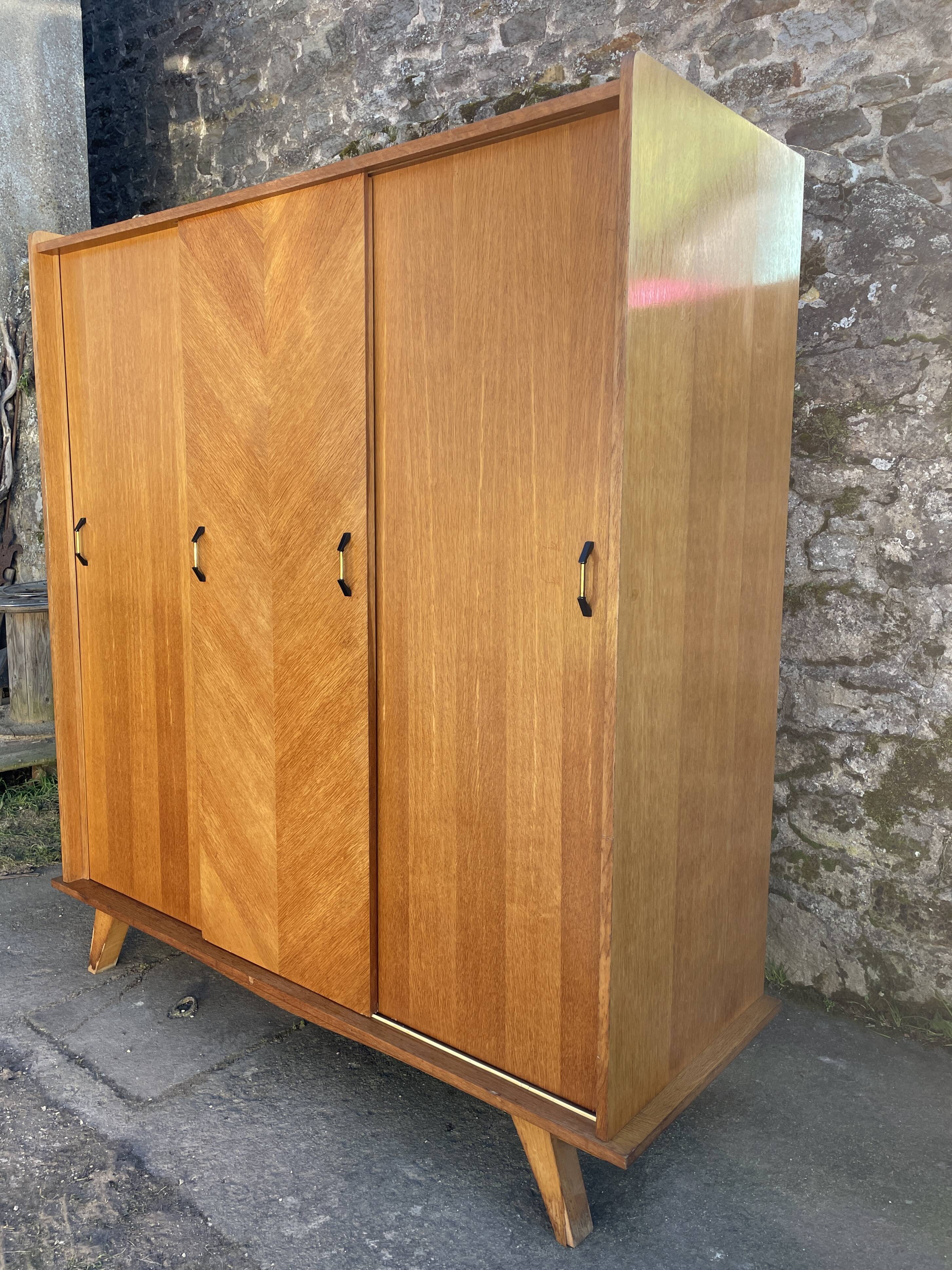 Light oak sliding door wardrobe, 1960