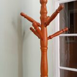Wooden coat rack on stand