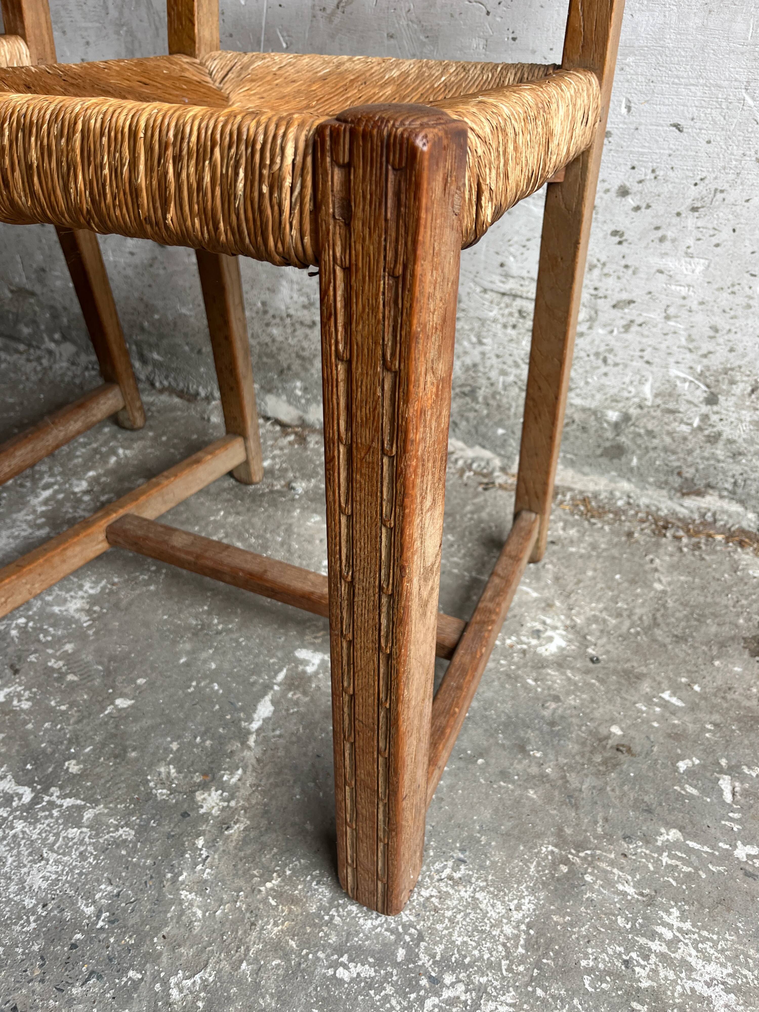 Set of 6 sculpted oak chairs with straw seats – 1950s