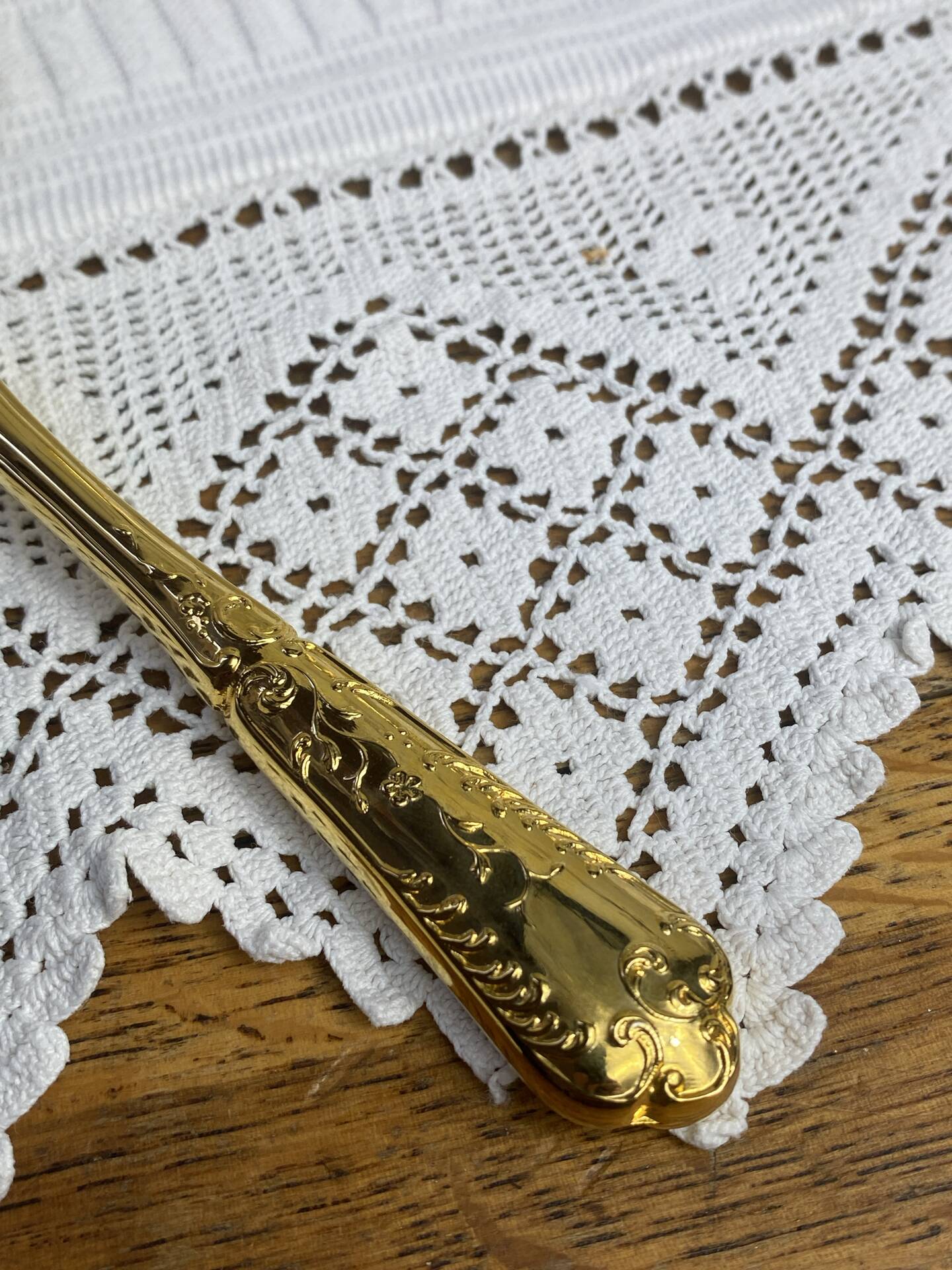 Dessert spoons and serving ladle