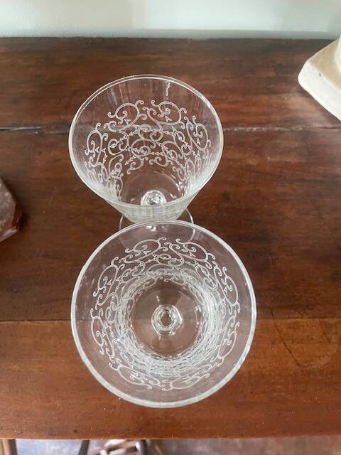 2 large engraved water glasses in arabesque.