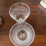 2 large engraved water glasses in arabesque.