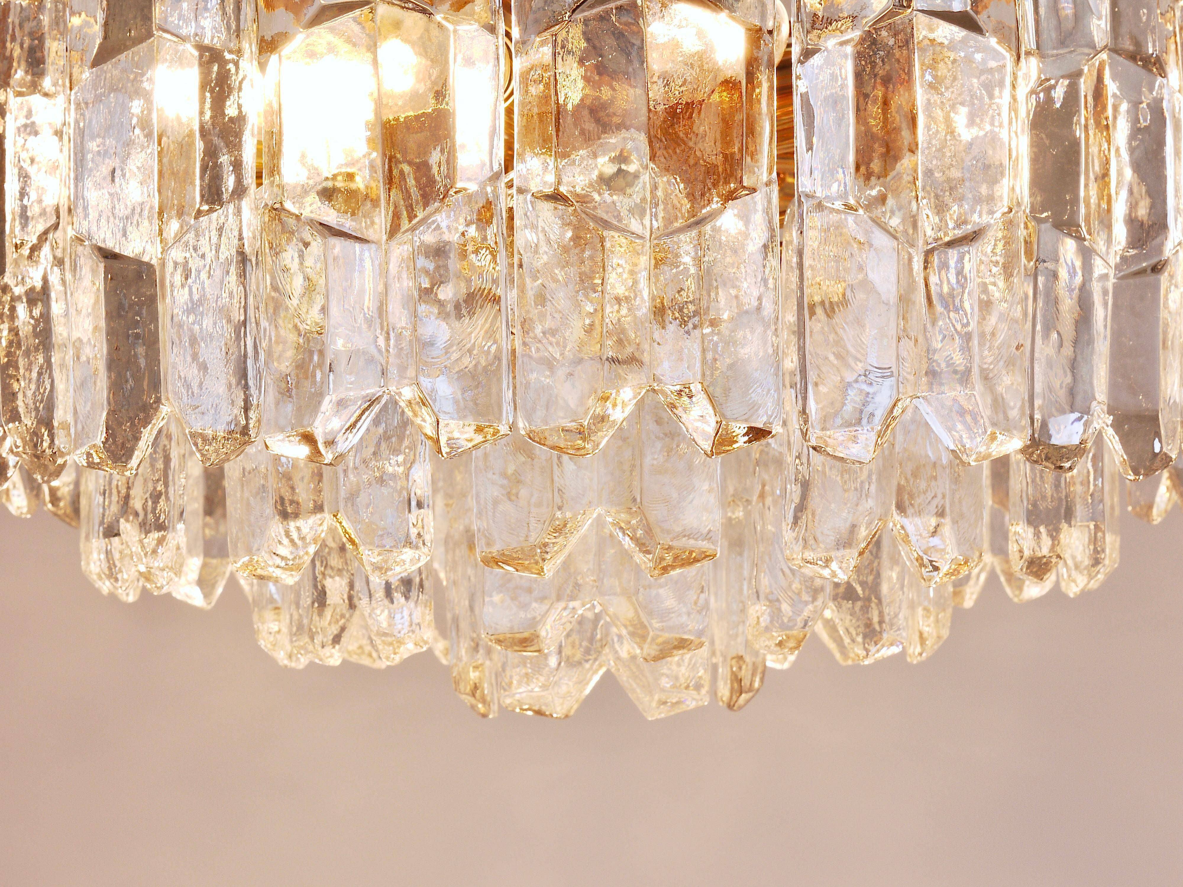 Large ceiling chandelier in gilded brass and glass Palazzo J.T. Kalmar, 1950s