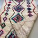 Moroccan Berber rug in cream wool with multicoloured diamonds – 250 × 147 cm