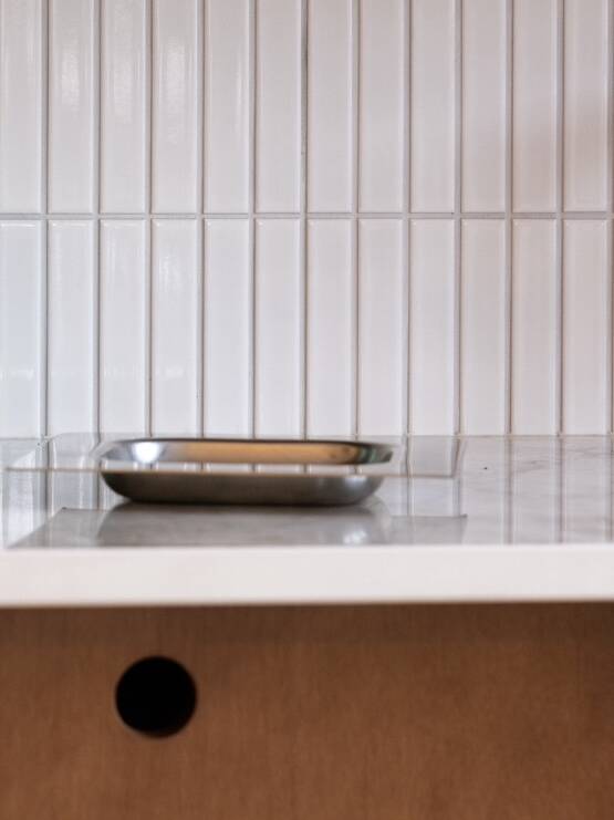 Minimalist stainless steel pocket emptier