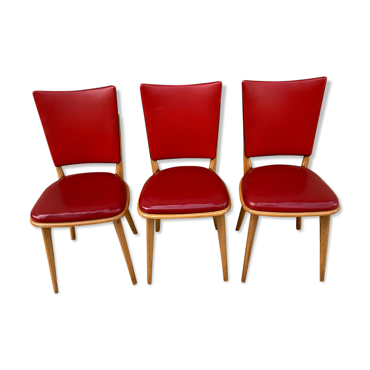 3 chairs in red Skaï