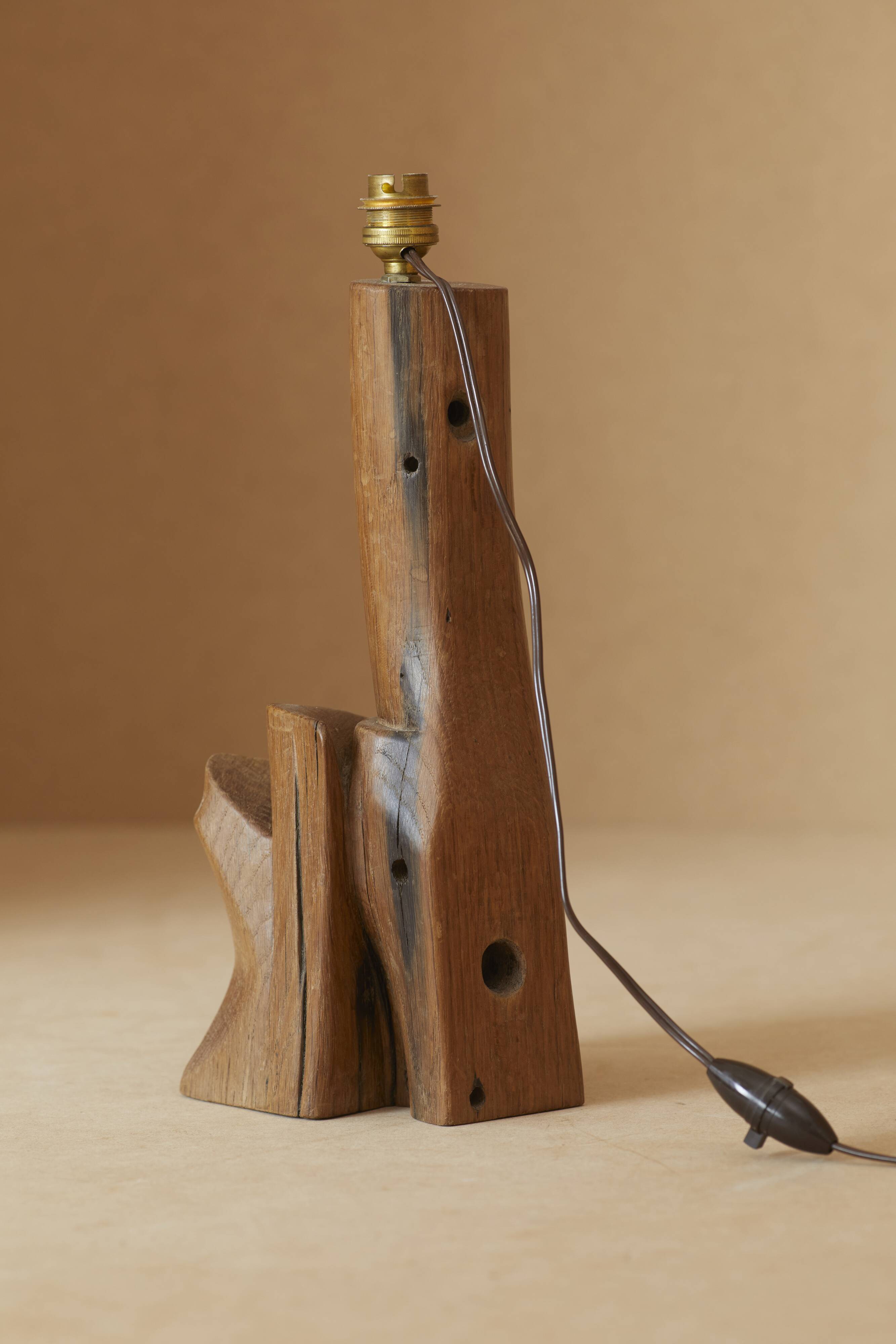 Sculptural lamp in solid wood circa 1960