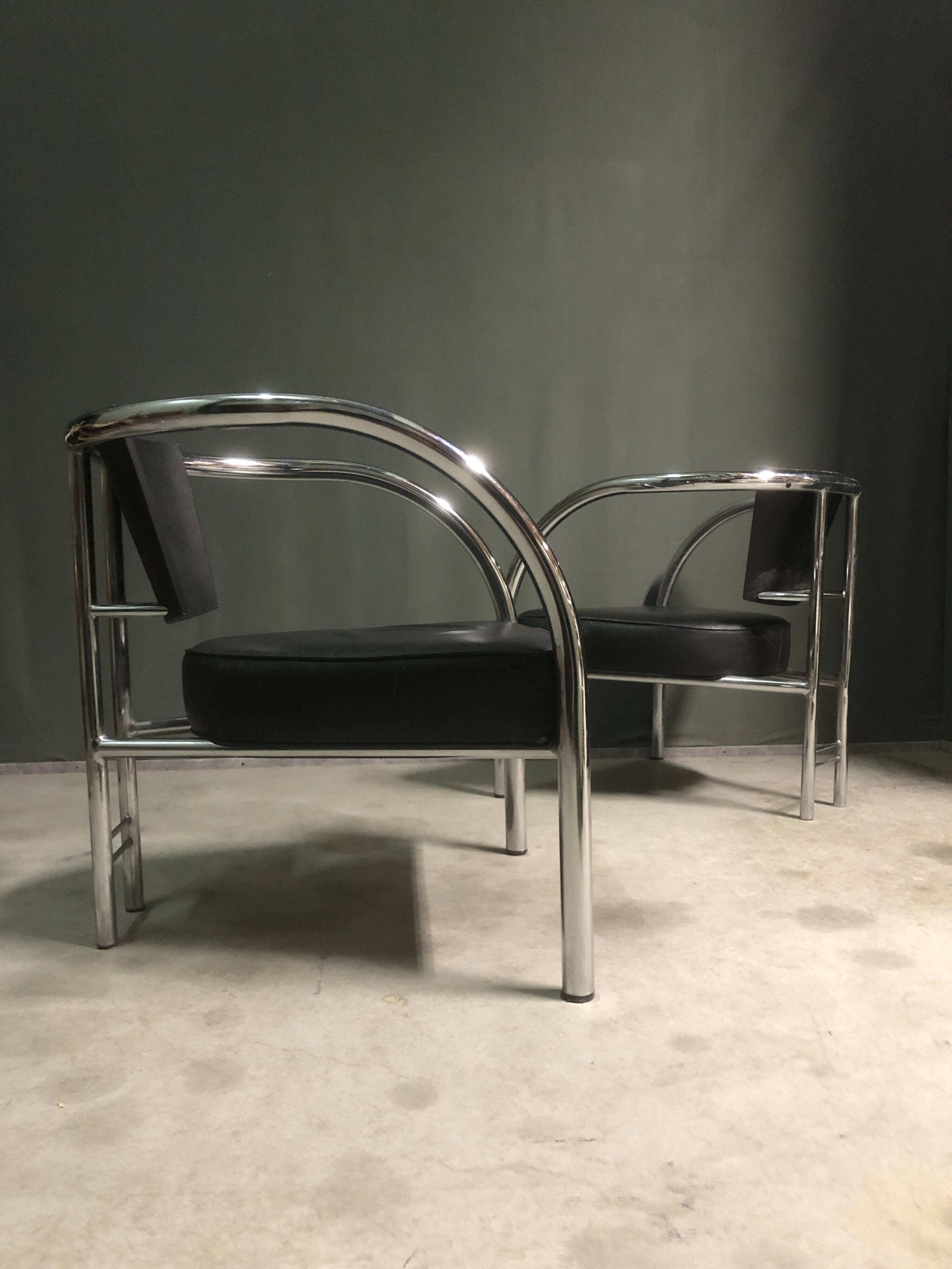 A pair of petite low armchairs by ronald cecil sportes for lumen center, 1987