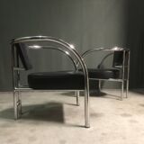A pair of petite low armchairs by ronald cecil sportes for lumen center, 1987