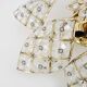 Antique 4-light star-shaped ceiling light in brass, glass pendants. 1980s