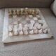 Chess set in onyx and marble
