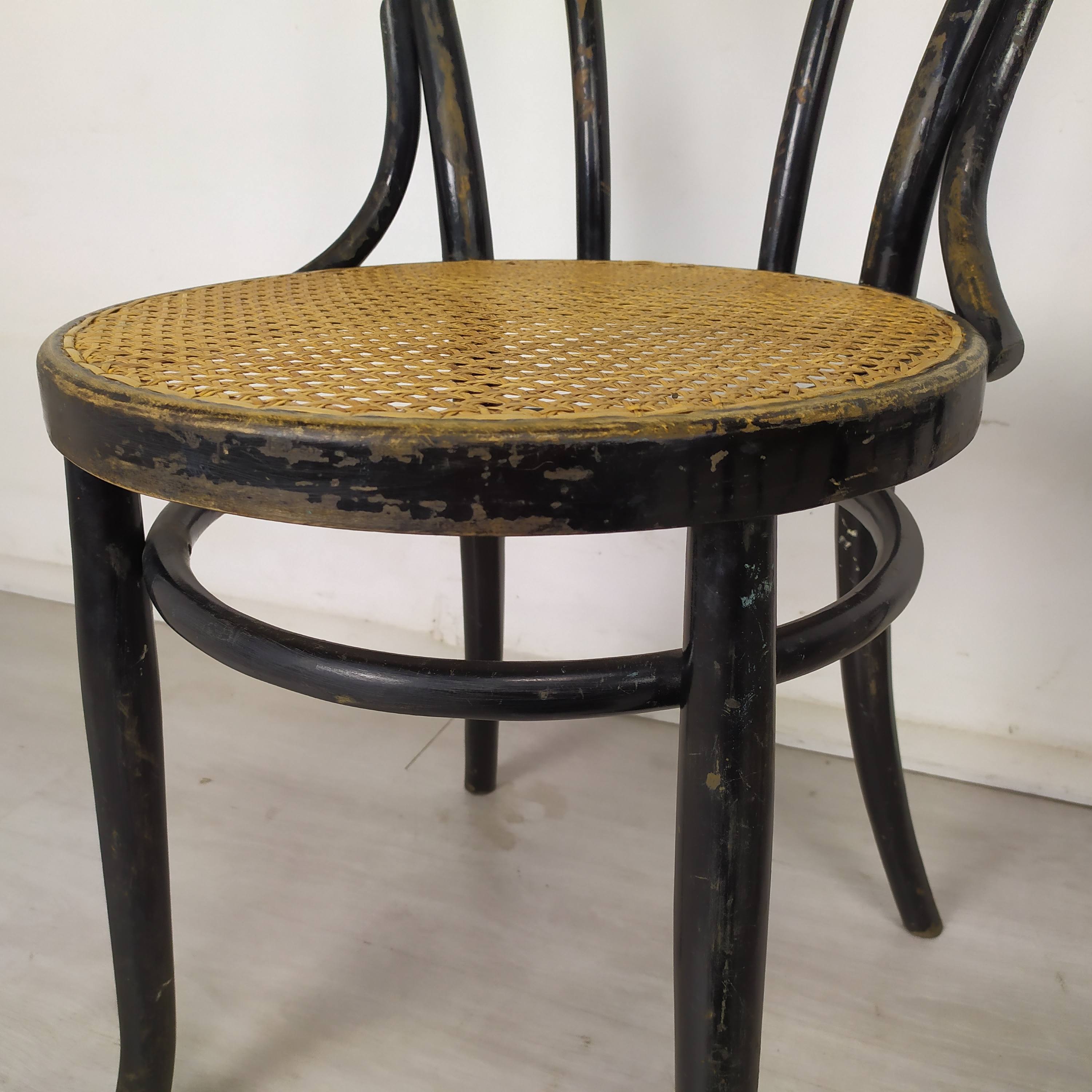 Black canned bistro chairs