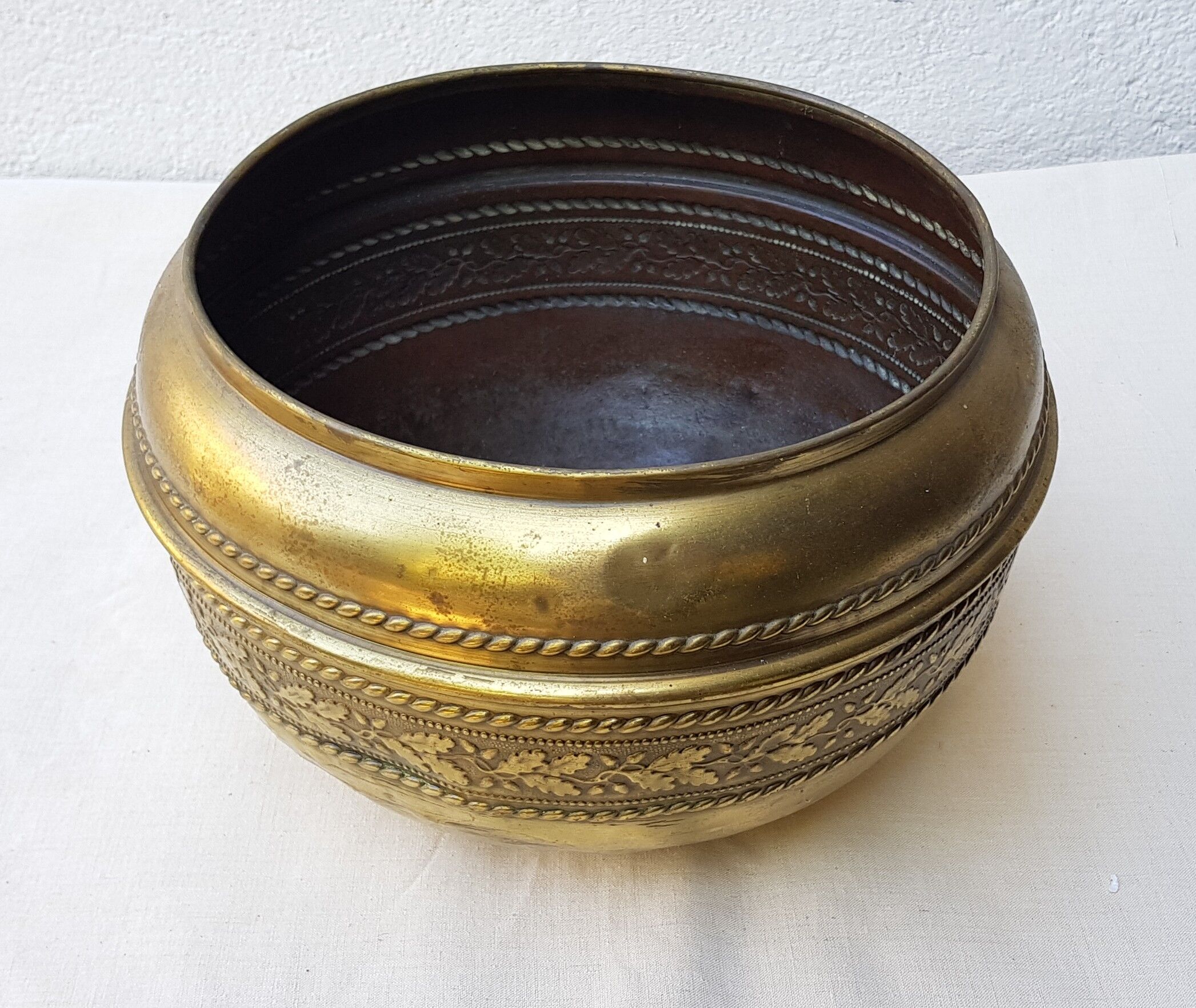 Brass pot cover