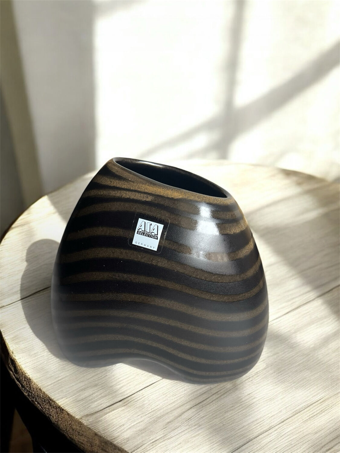 Cuba AZA Germany ceramic vase with a brown stripe.