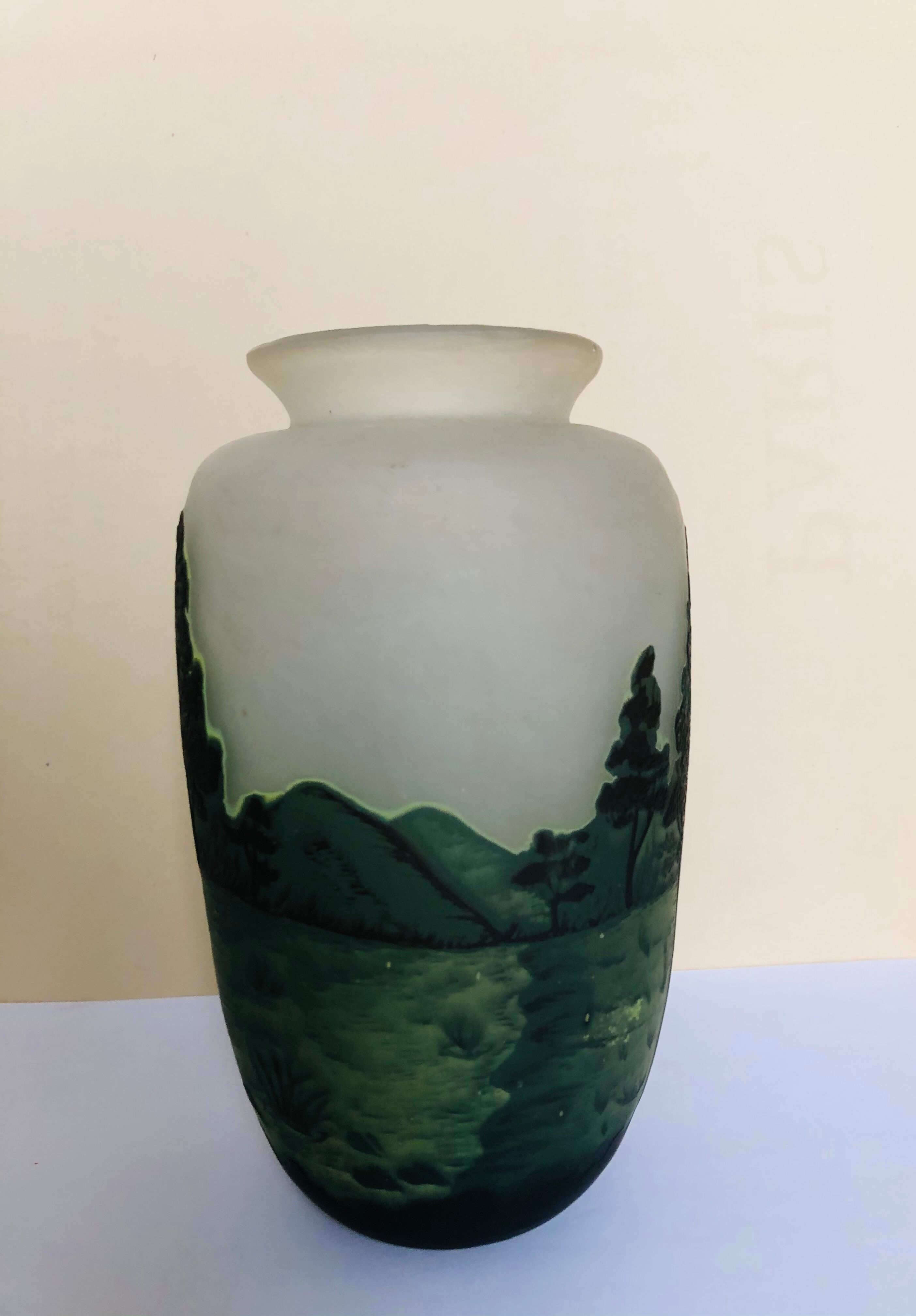 Multilayered glass vase engraved with acid
