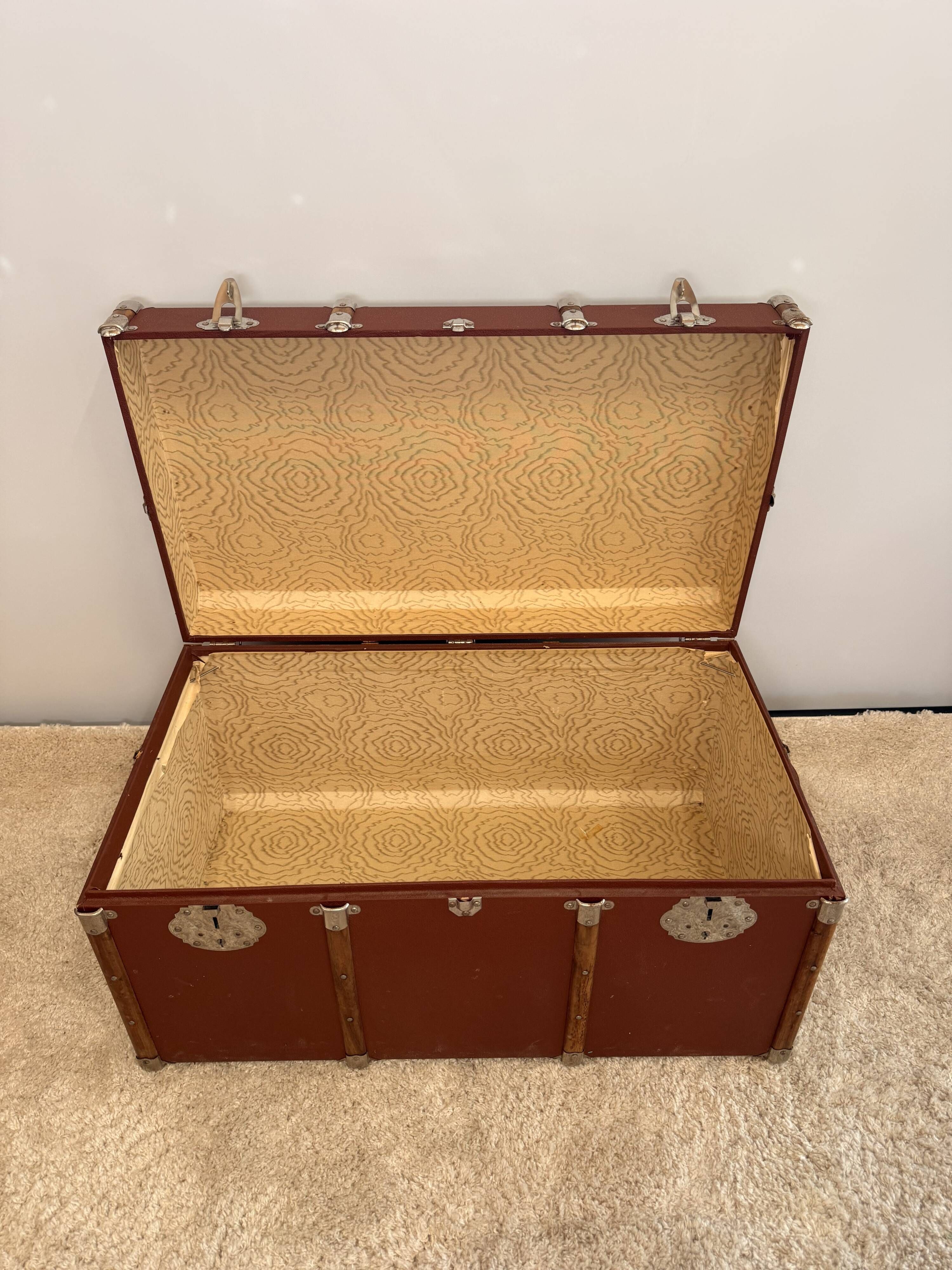 Vintage wooden and metal travel trunk