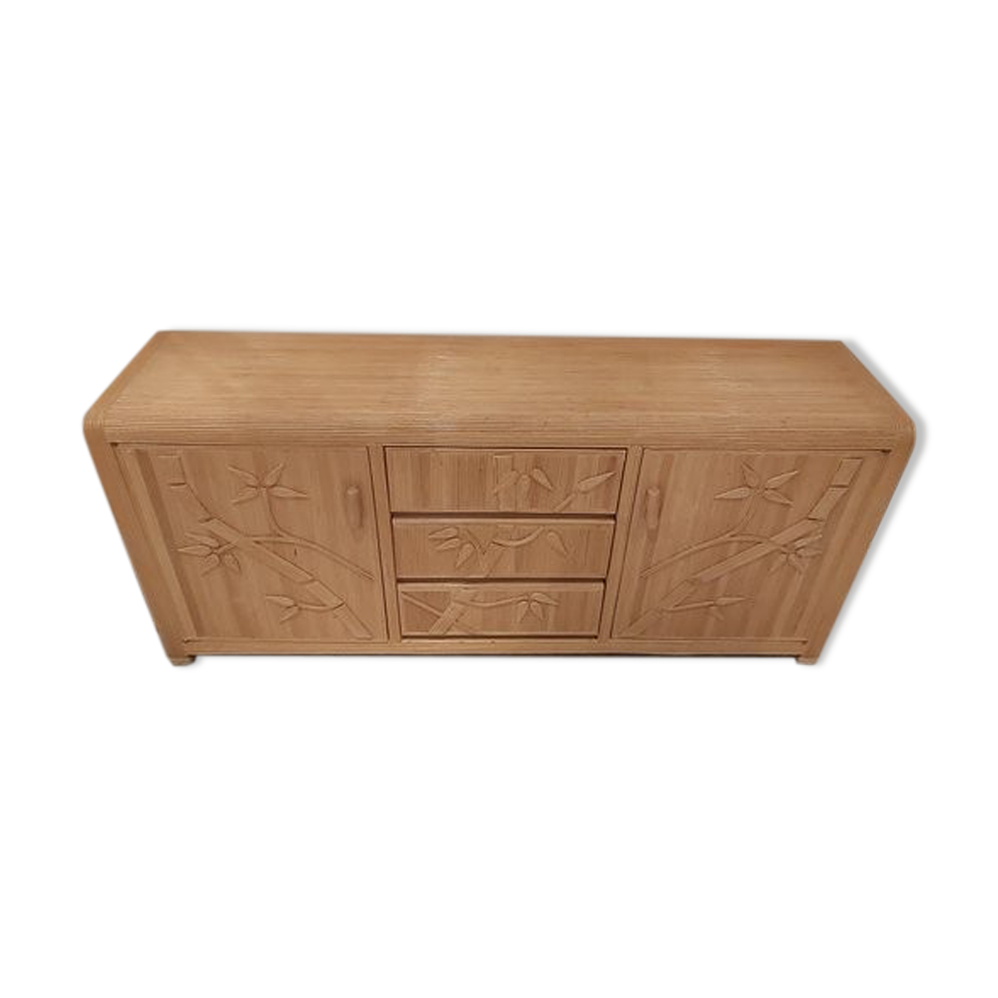 Vintage wicker sideboard with flowers