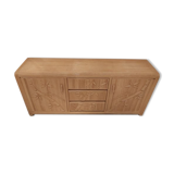 Vintage wicker sideboard with flowers