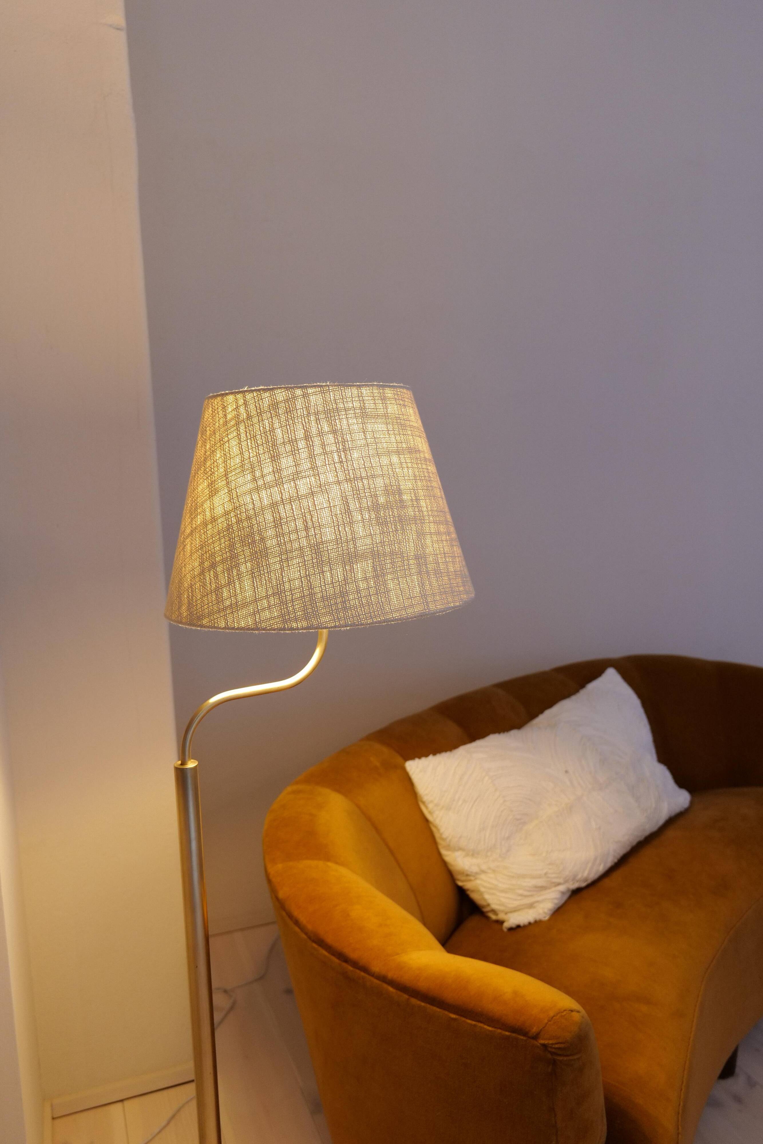 Sculptural modern brass floor lamps from the mid-century Luxus, Sweden, 1970s.