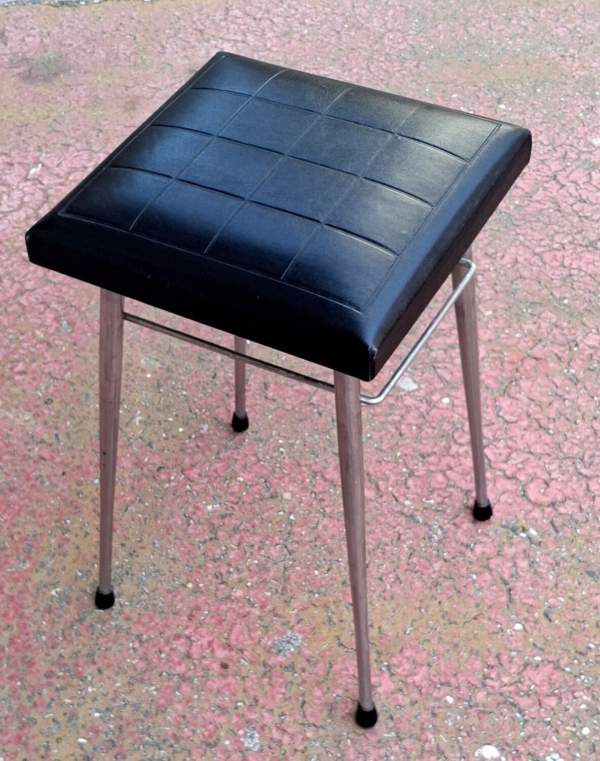 Black faux leather and chrome stool. 1970s, vintage seventies decor.