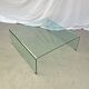 Curved glass coffee table