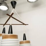 Scandinavian triangle pendant light in cascade with 3 opalines