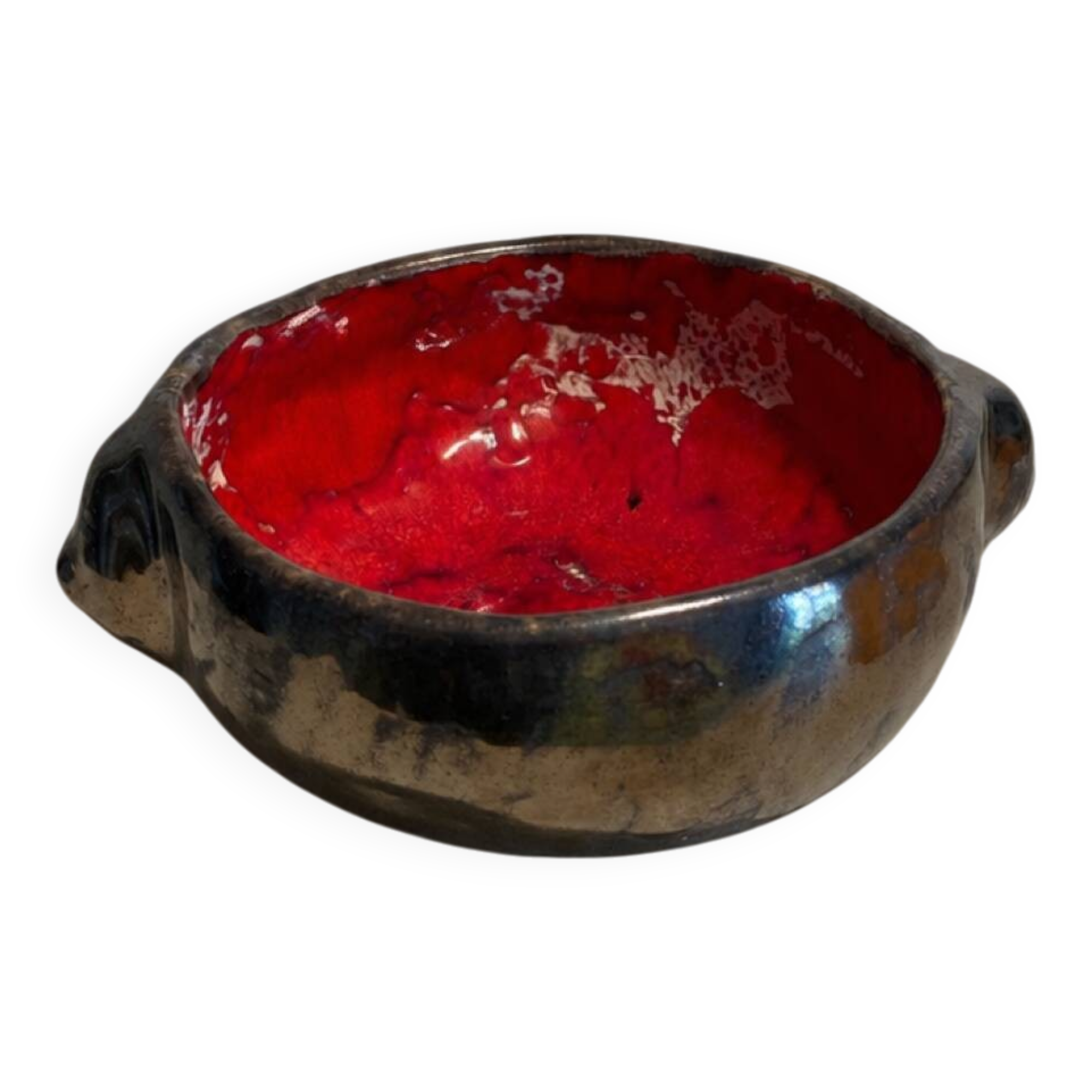 Deep red glazed and metallic ceramic catchall.