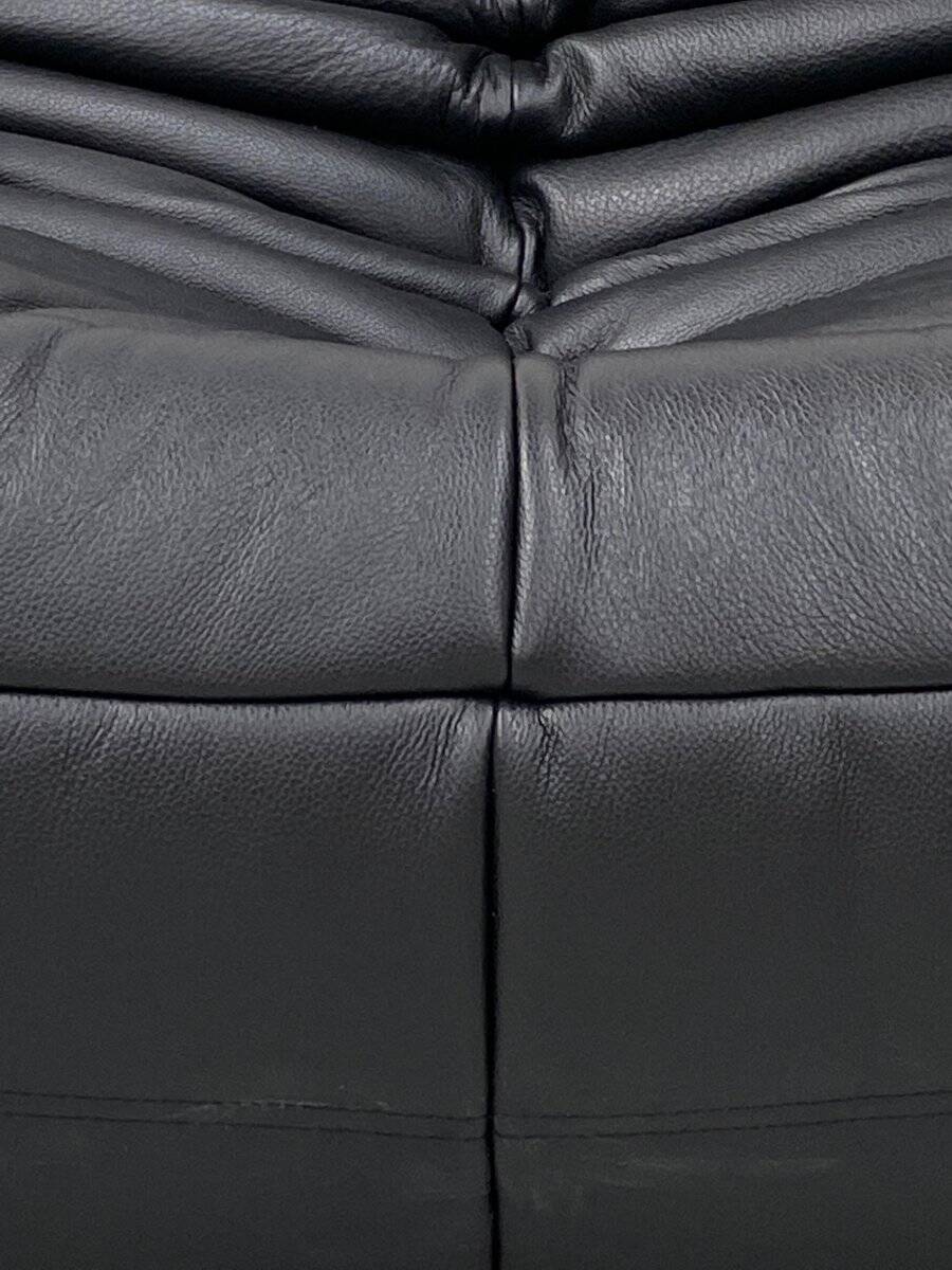 Set of French Togo lounge chair and ottoman in black leather attributed to Michel Ducaroy for Ligne Roset, 1970s