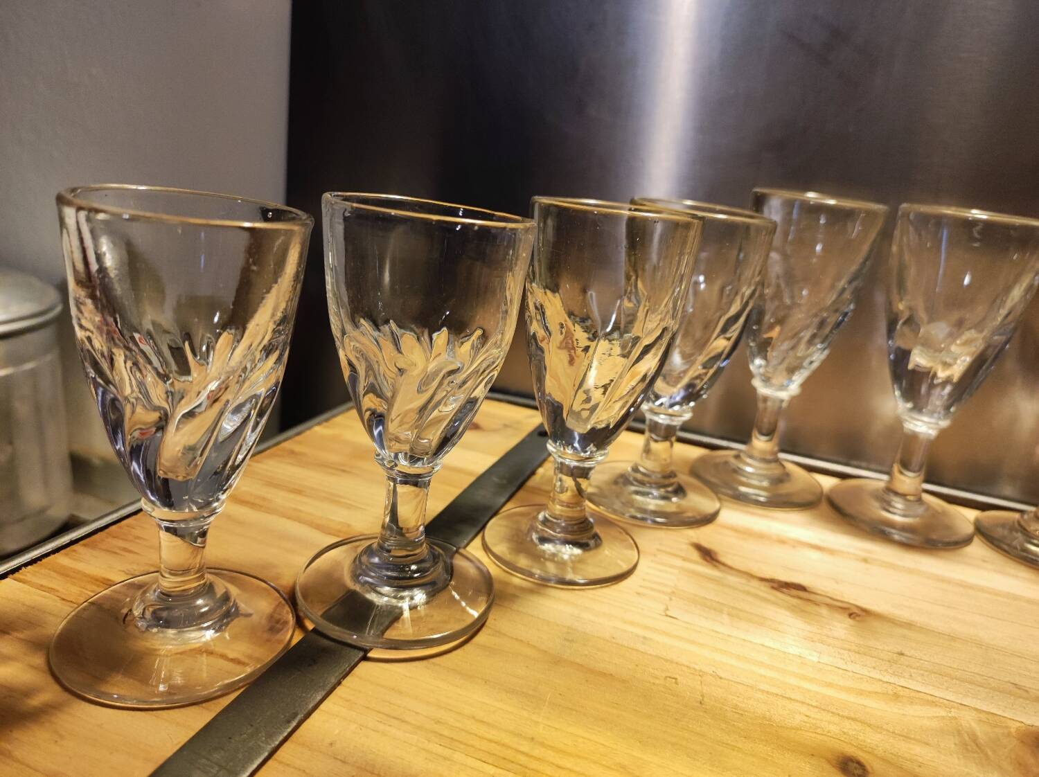 12 small twisted bistro glasses, 19th century
