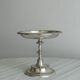 Silver-plated metal stand.
