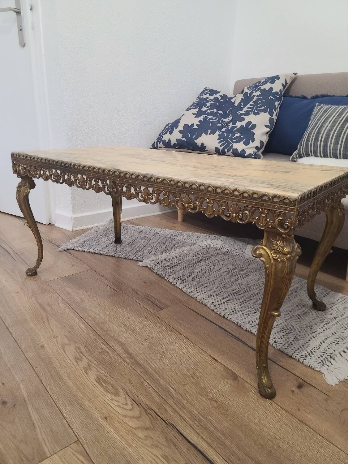Marble coffee table with brass legs