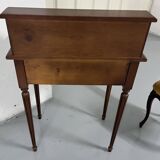 Old-fashioned secretary desk and chair set.