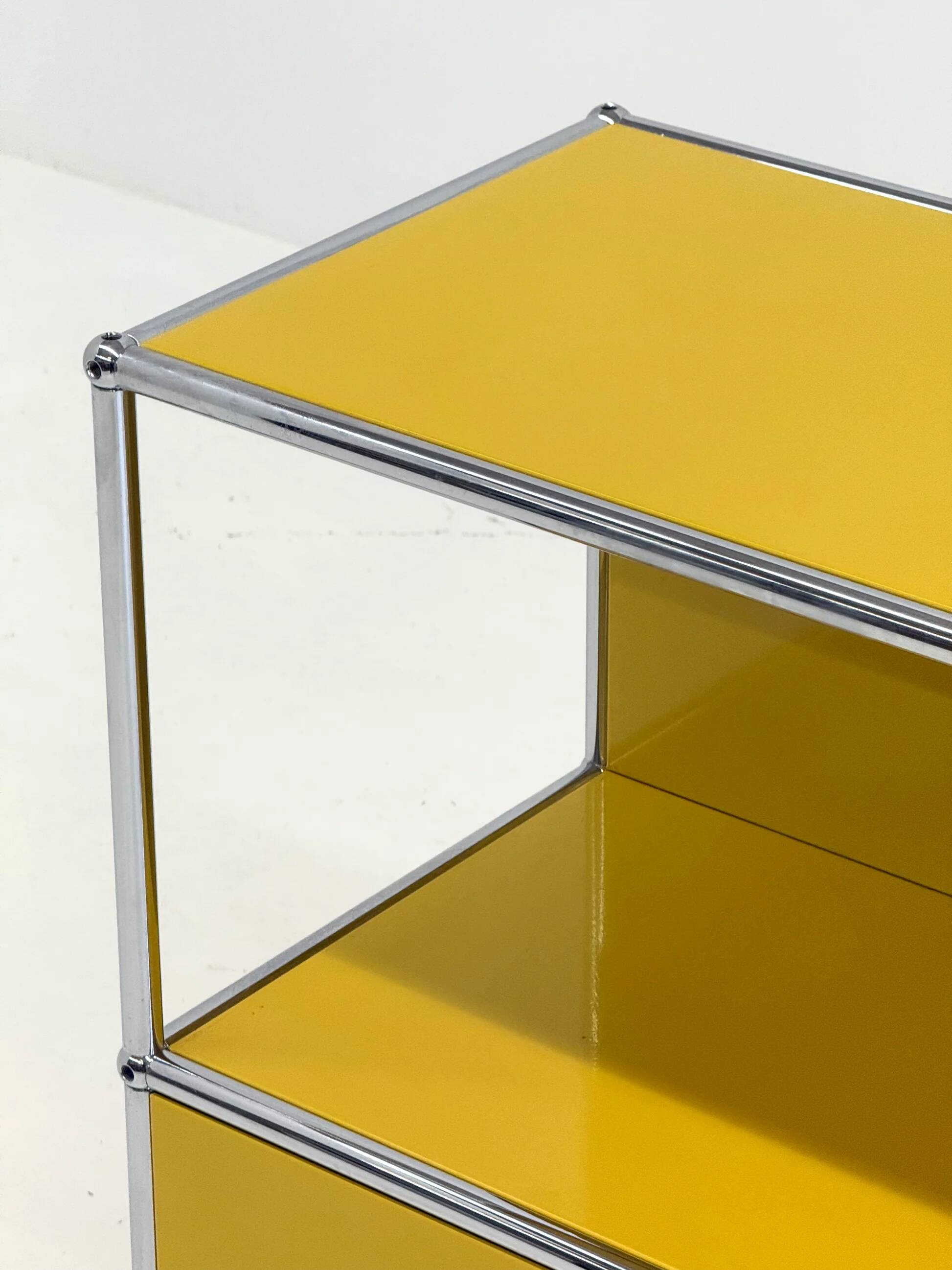 USM Haller cabinet in yellow