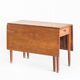 Vintage table with two folding leaves. Solid oak wood. France, 1940s