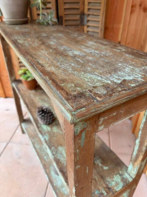 Teak shelves with a green patina