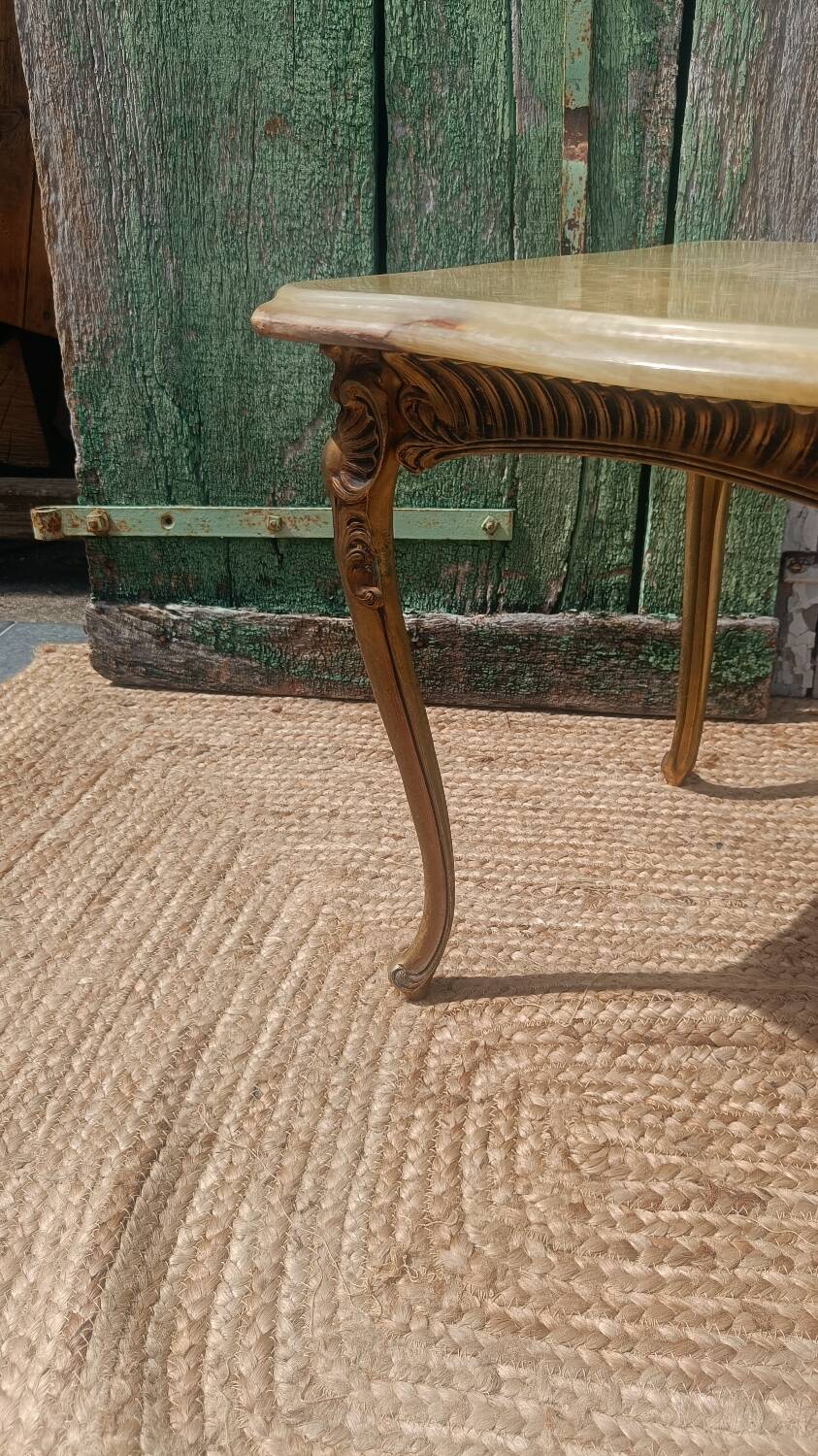 Vintage side table in gilded brass with an onyx top.