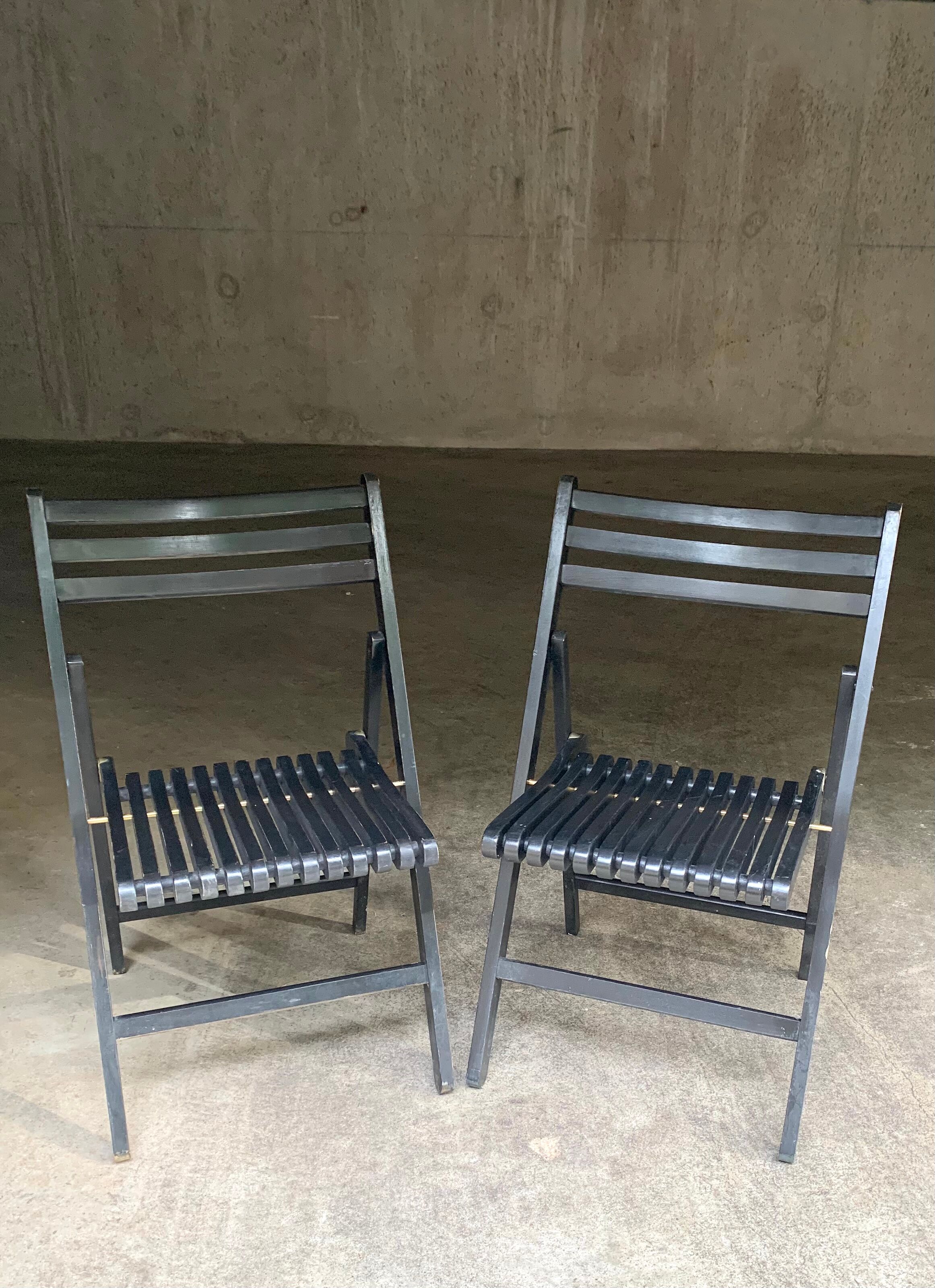 Pair of black folding chairs