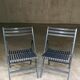 Pair of black folding chairs