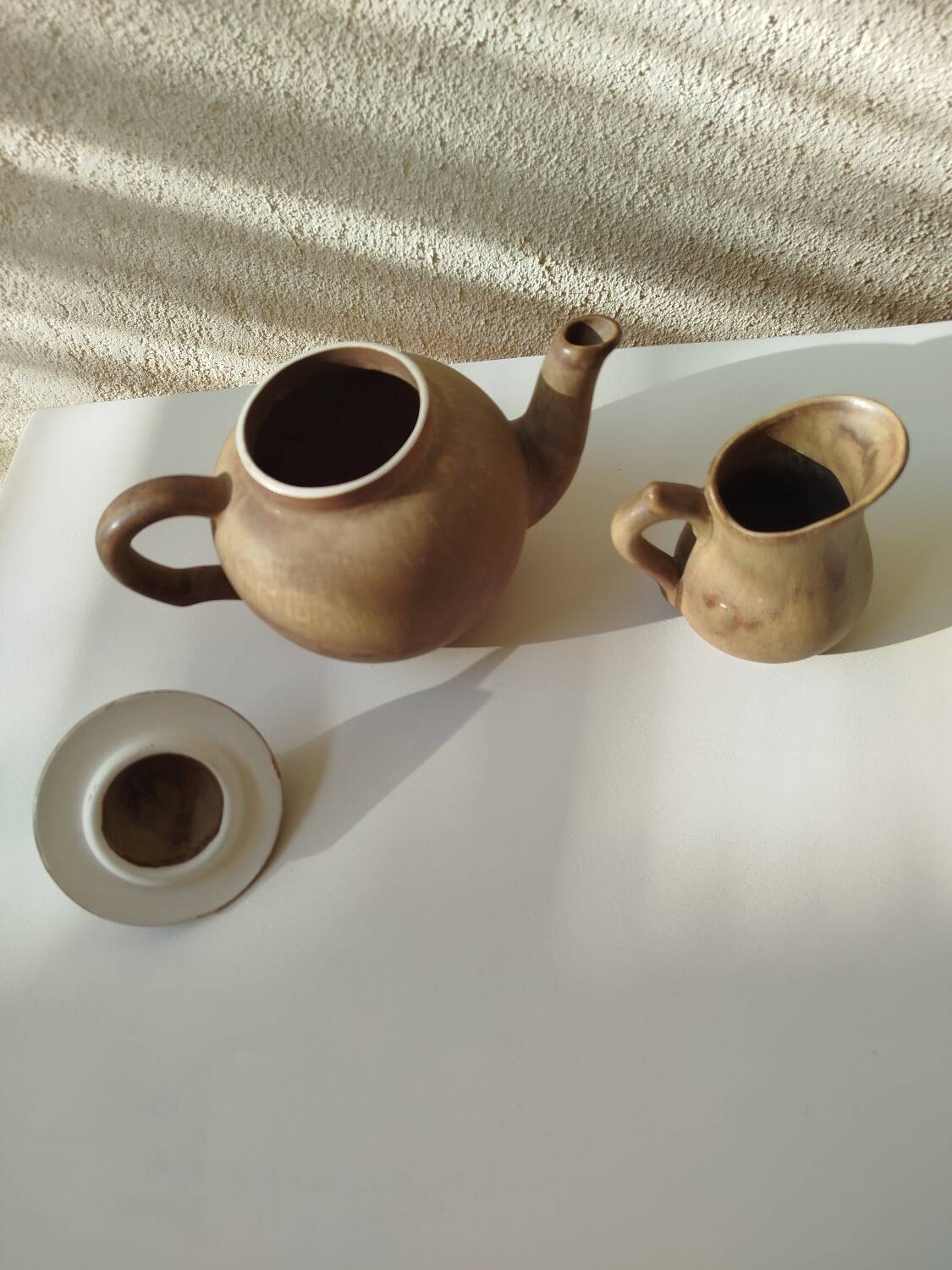 Teapot and small earthenware pot