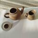 Teapot and small earthenware pot