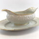 Gravy boat in white and golden porcelain Limoges flat Christmas feast