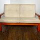 Scandinavian 2-seater bench sofa in teak and wool.