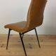 Pair of 1950s chairs with compass legs and brown faux leather.