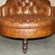 Leather Chesterfield tête-à-tête sofa, 4-seater