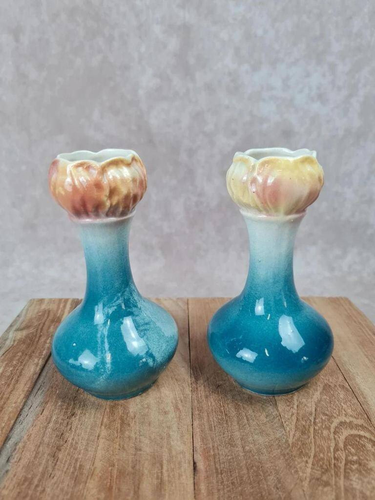 Pair of small antique bud vases numbered 396.