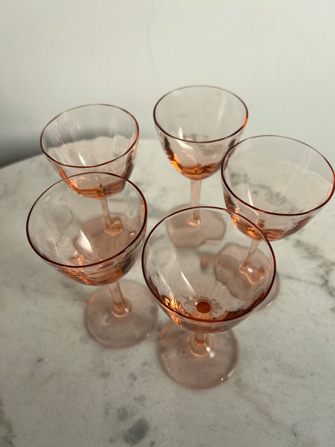 5 small pink glass stemmed glasses