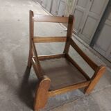 Armchairs in leather and vintage wood 70's