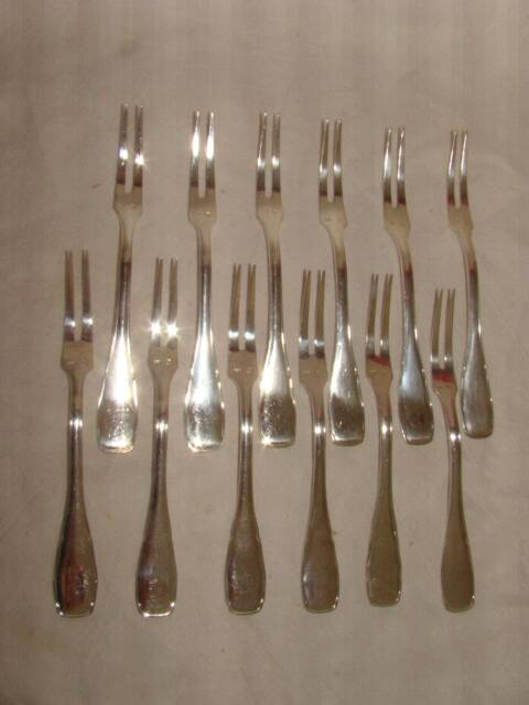 12 silver-plated snail forks with case