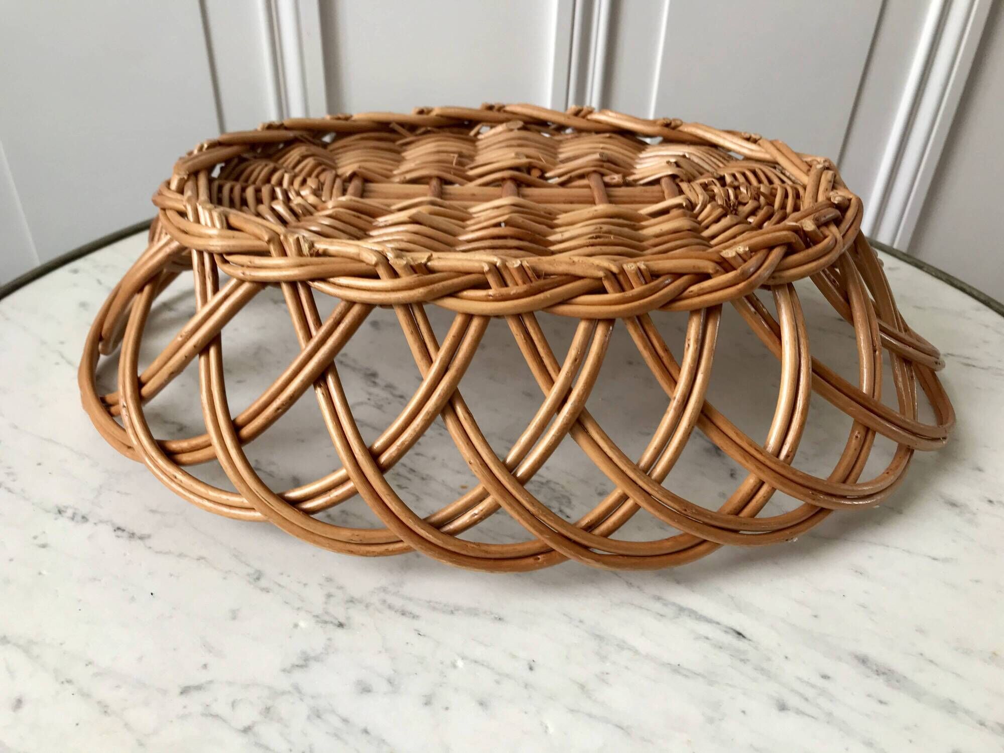 trio of woven rattan and bamboo baskets from the 60s and 70s