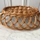 trio of woven rattan and bamboo baskets from the 60s and 70s